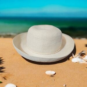 Styling summer hat with cute rolled brim. Scala brand